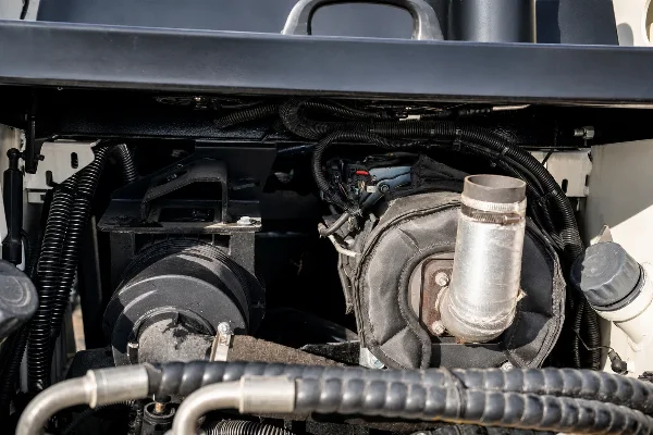 Engine compartment detail on the CDM312 for service access and maintenance checks.
