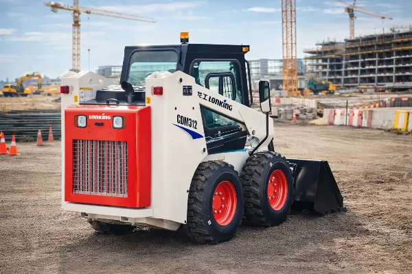 Rear jobsite view of the CDM312 showing compact dimensions and worksite mobility.