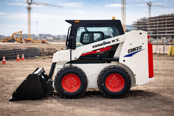 CDM312 mini skid steer loader positioned for grading and soil handling on a compact site.