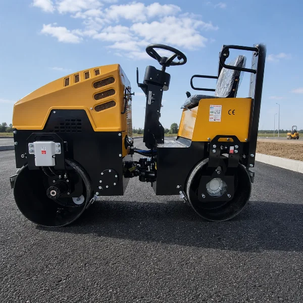 Bautrax DR10 tandem vibratory roller side profile on fresh asphalt with both drums visible.