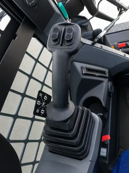 XCMG XC7-SR08 joystick control detail inside the enclosed operator cabin.