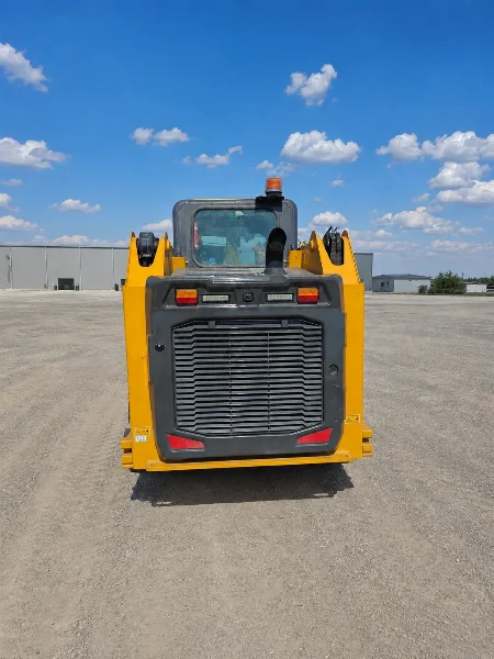 XCMG XC7-SR08 mini skid steer loader rear view showing grille, rear lights and compact body.